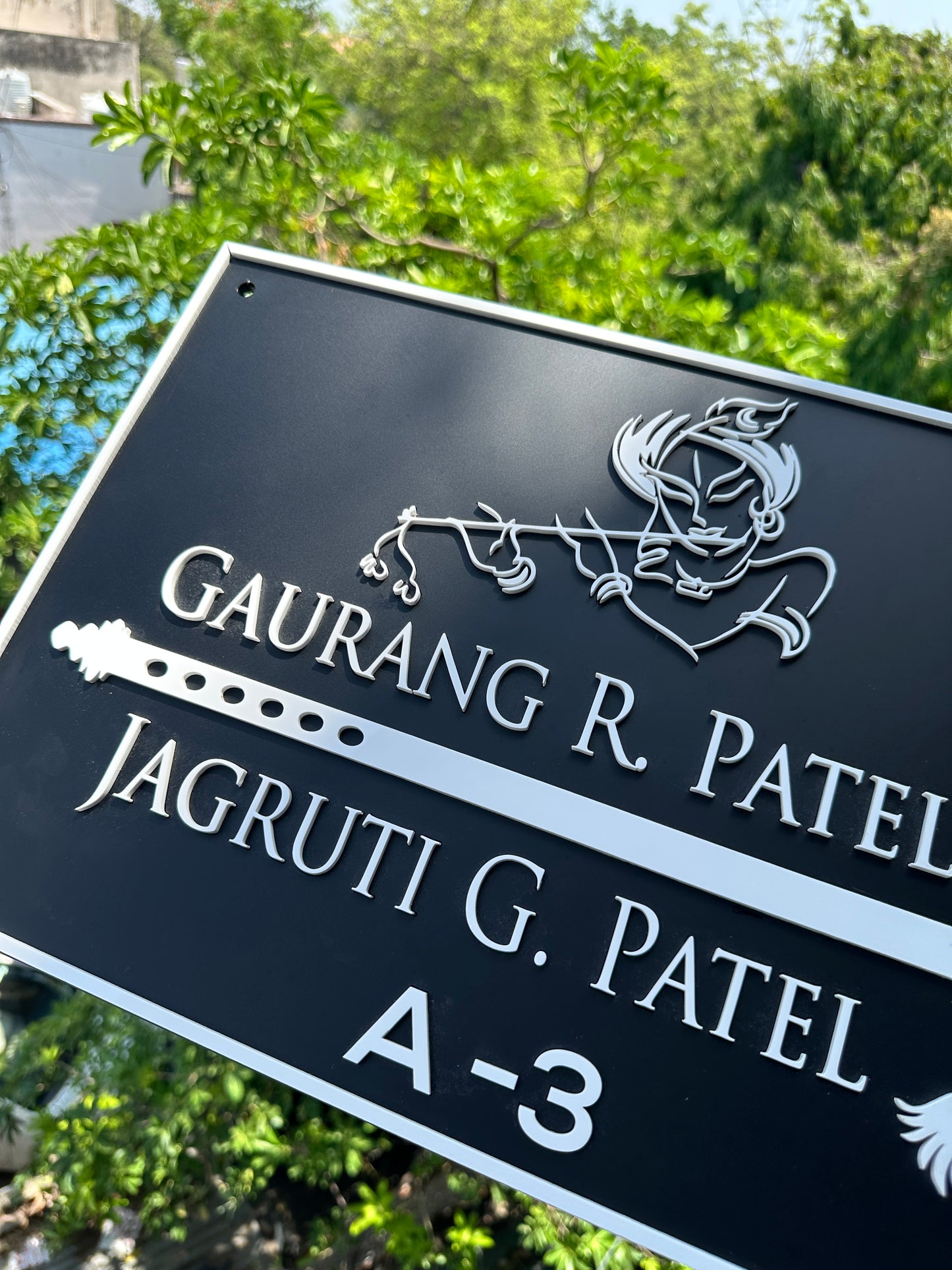 Krishna Flute nameplate